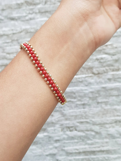 Pulsera bola Oro Laminado 14K con perla de color rojo - Línea Adamoon